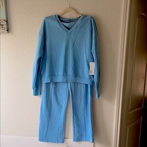 Yogalicious Light Blue women two piece Set. Size L